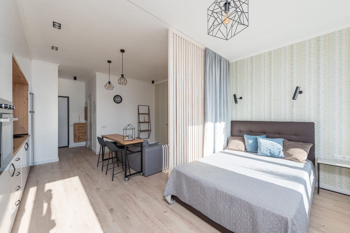 A studio apartment where the sleeping area and the living area share a single room