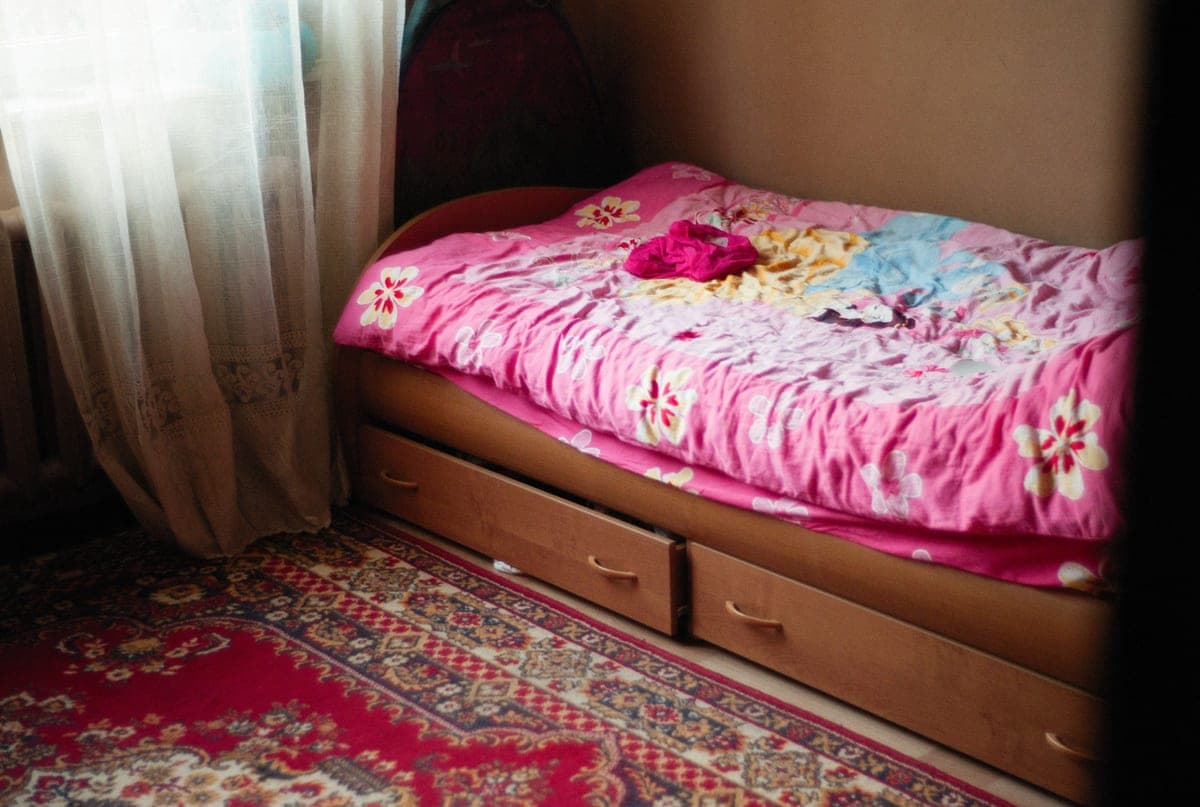 A single bed with usable storage space underneath the frame